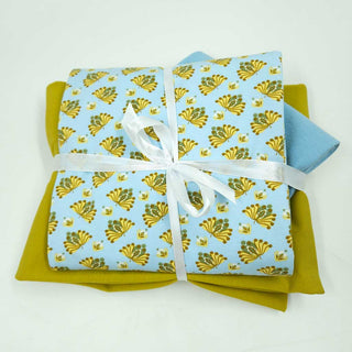 Stoffpaket 2,5 m – Baumwolljersey Retro Blüten in Eisblau & Senfgelb