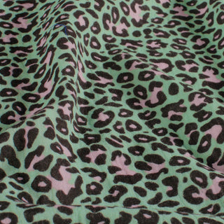 Musselin Stoff – Leopardenmuster in Rosa und Schwarz auf Mint