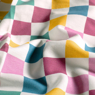 French Terry Stoff mit bunten Karos in Rosa und Petrol