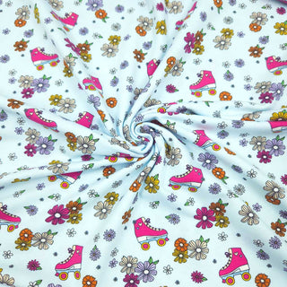 Baumwolljersey Stoff – Retro Rollschuhe & Blumen