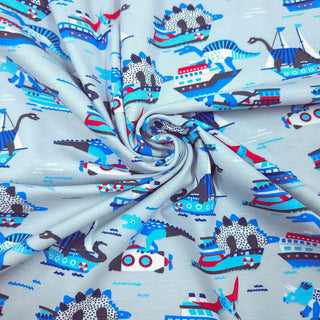 Baumwolljersey Stoff – Dino‑Boote Hellgrau