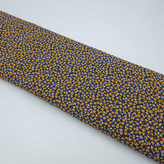 Viskose Stoff – Senfgelbe Streublümchen auf Dunkelblau