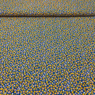 Viskose Stoff – Senfgelbe Streublümchen auf Dunkelblau