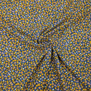 Viskose Stoff – Senfgelbe Streublümchen auf Dunkelblau