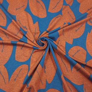 Viskosejersey Stoff – Blätter in Rost auf Petrol