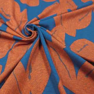 Viskosejersey Stoff – Blätter in Rost auf Petrol