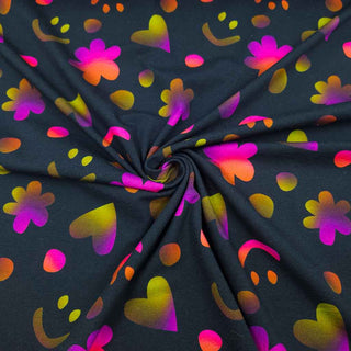 Baumwolljersey Stoff – Smiley, Herzen & Blumen auf Schwarz