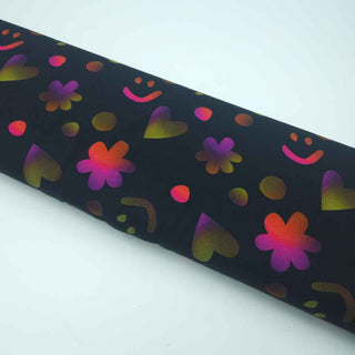 Baumwolljersey Stoff – Smiley, Herzen & Blumen auf Schwarz
