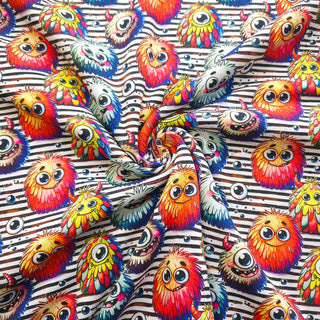 Alpenfleece Stoff – Lustige Monster