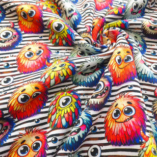 Alpenfleece Stoff – Lustige Monster