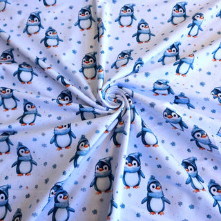 Baumwolljersey Stoff – Winterpinguine auf Weiß