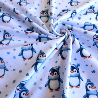 Baumwolljersey Stoff – Winterpinguine auf Weiß