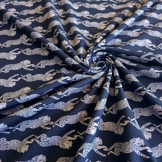 Baumwolljersey Stoff - Elegante Geparden auf Schwarz