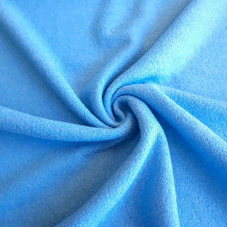 Wollbouclé Stoff - Uni in Himmelblau