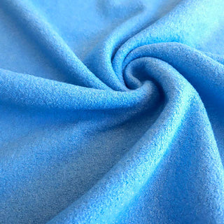 Wollbouclé Stoff - Uni in Himmelblau