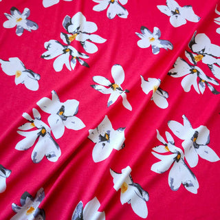 Viskose Jersey Stoff - Magnolienblüten in Himbeerrot