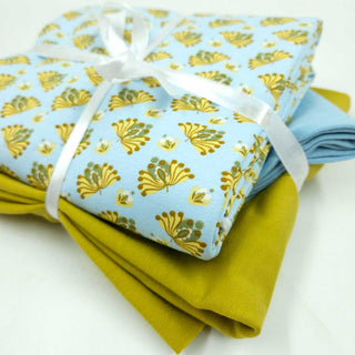 Stoffpaket 2,5 m - Baumwolljersey Retro Blüten in Eisblau & Senfgelb