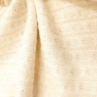 Strickstoff Metallic Creme