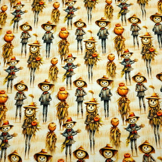 French Terry Stoff mit Vogelscheuchen auf Beige