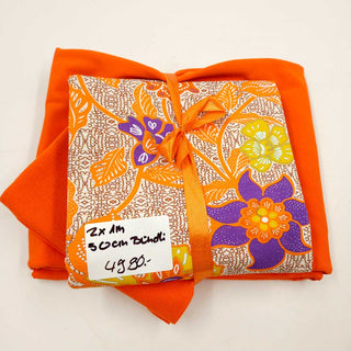 Stoffpaket 2,5 m – Baumwolljersey Batik Blumen in Orange & Lila