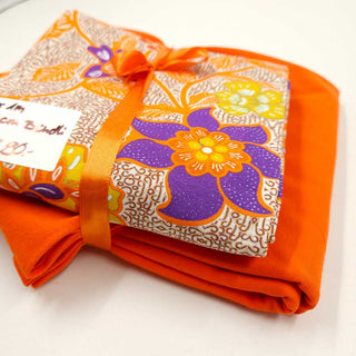 Stoffpaket 2,5 m – Baumwolljersey Batik Blumen in Orange & Lila – Ansicht 2
