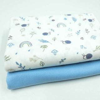 Stoffpaket 1,2 m – Baumwolljersey Schnecken & Regenbögen in Wollweiss & Hellblau – Ansicht 3
