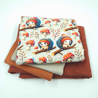 Stoffpaket 2,6 m – Baumwolljersey Igel mit Fliegenpilzen in Beige & Rost