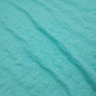 Cloqué Stoff Uni Mint mit Blüten-Relief
