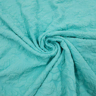 Cloqué Stoff Uni Mint mit Blüten-Relief