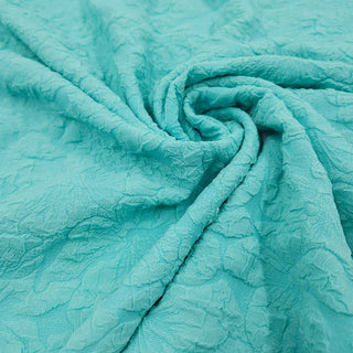Cloqué Stoff Uni Mint mit Blüten-Relief