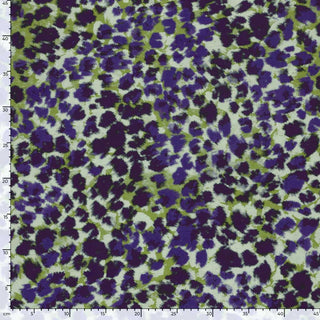 French Terry Stoff mit Leo Muster in Lila und Grün – moderner Animal Print