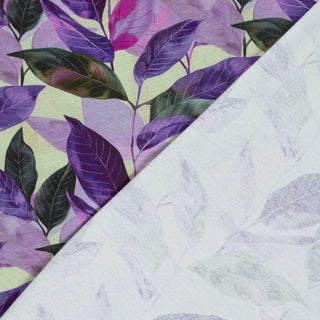 French Terry Stoff mit Aquarell-Blättermotiv in Lila und Grün – weicher Baumwollstoff mit angenehmer Haptik