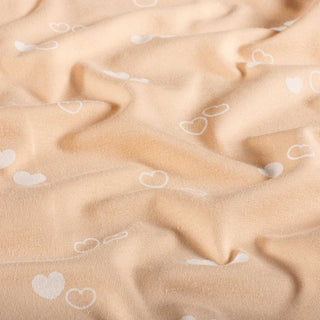 Baumwolljersey Stoff - Feine Herzen auf Apricot