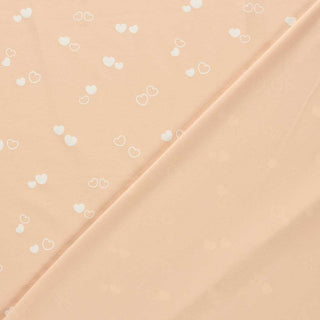 Baumwolljersey Stoff - Feine Herzen auf Apricot