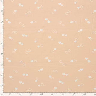 Baumwolljersey Stoff - Feine Herzen auf Apricot