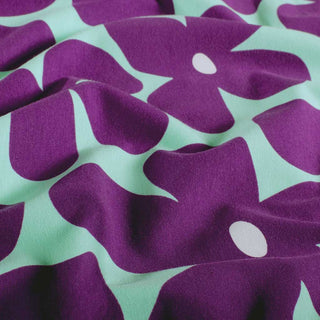 Baumwolljersey Stoff – Grosse Blumen Lila Mint