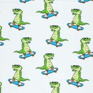 Baumwolljersey Stoff – Krokodil auf Skateboard