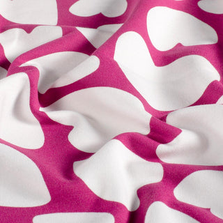 French Terry Stoff - Weisse Herzen auf Pink