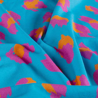 Baumwolljersey Stoff – Leo Türkis mit Pink & Orange