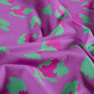 Baumwolljersey Stoff – Leo Violett mit Pink & Grün