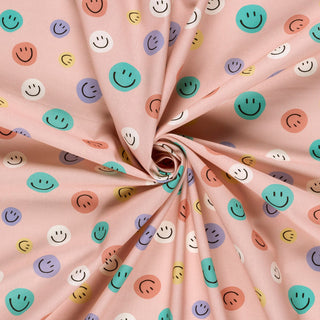 Baumwollstoff Popeline Bunte Smileys auf Altrosa – Farben und Struktur