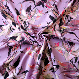 Baumwolljersey Stoff - Lilien auf Mauve
