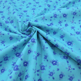 Baumwollstoff Popeline - Blaue Blumen auf Mint