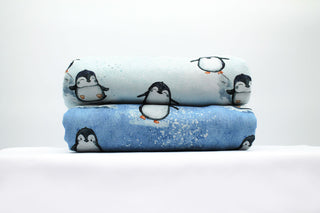 French Terry Stoff - Pinguine in Eisblau