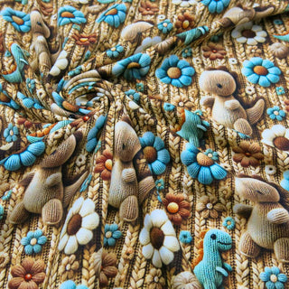 Jersey Stoff 3D Digitaldruck mit gestrickten Dinos und bunten Blumen – elastischer Baumwollstoff für Kinderkleidung von Stoffrestposten