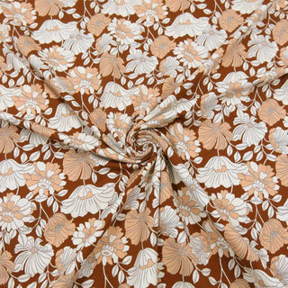 Baumwolljersey Stoff – Retroblumen in Rostbraun