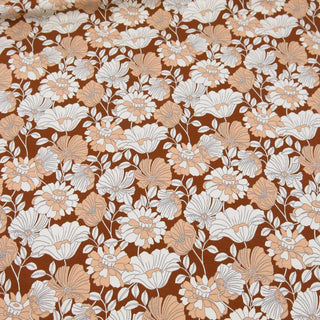 Baumwolljersey Stoff – Retroblumen in Rostbraun
