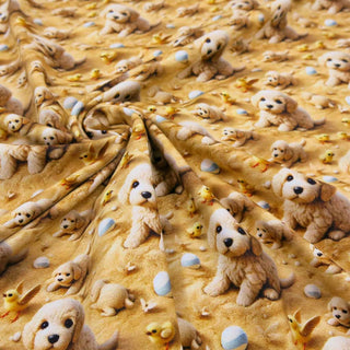 Bio Jersey Stoff „Fluffy Friends“ – süsse Welpen auf Sand