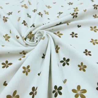 Weißer Baumwolljersey mit zartem Blumenprint in Naturtönen – elastischer Jersey Stoff für bequeme Kleidung und Accessoires, verfügbar bei Stoffrestposten.