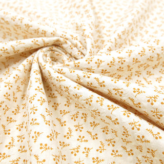 Vintage Seersucker Baumwollstoff in Creme mit gelbem Blumenmuster, 100% Baumwolle, 143 cm Breite, 118 g/m² Gewicht, ideal für leichte Sommerbekleidung und Heimtextilien, verfügbar bei stoffrestposten